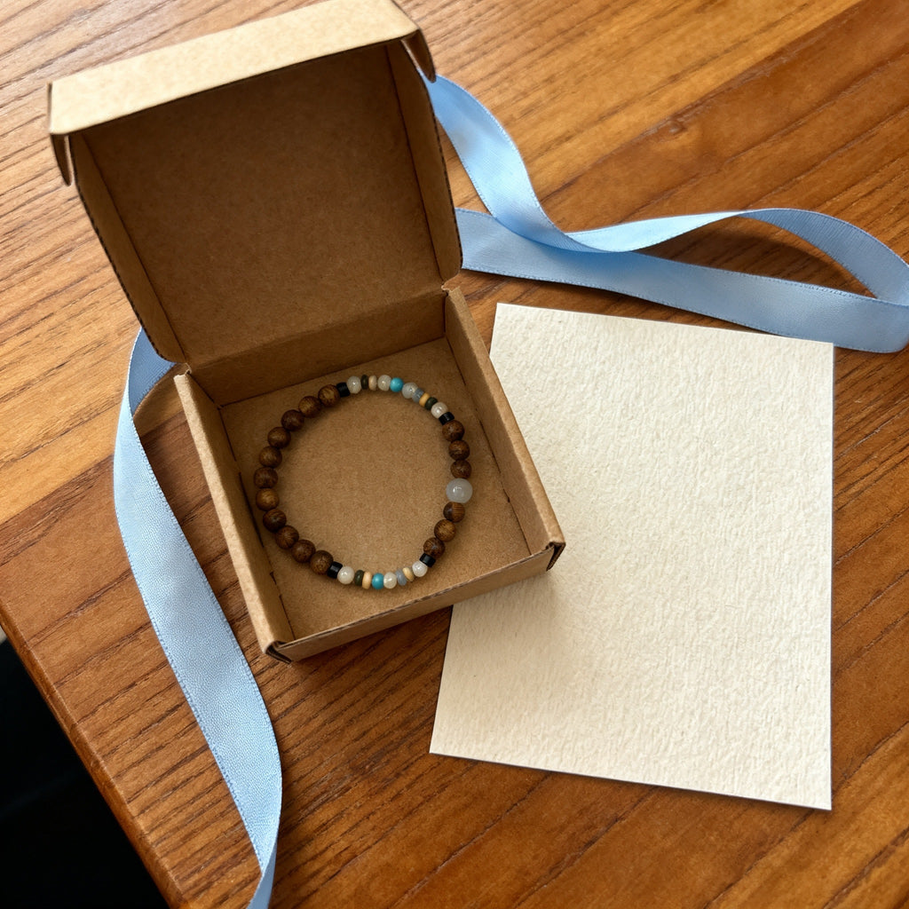 A harmony of Agarwood and natural gemstones