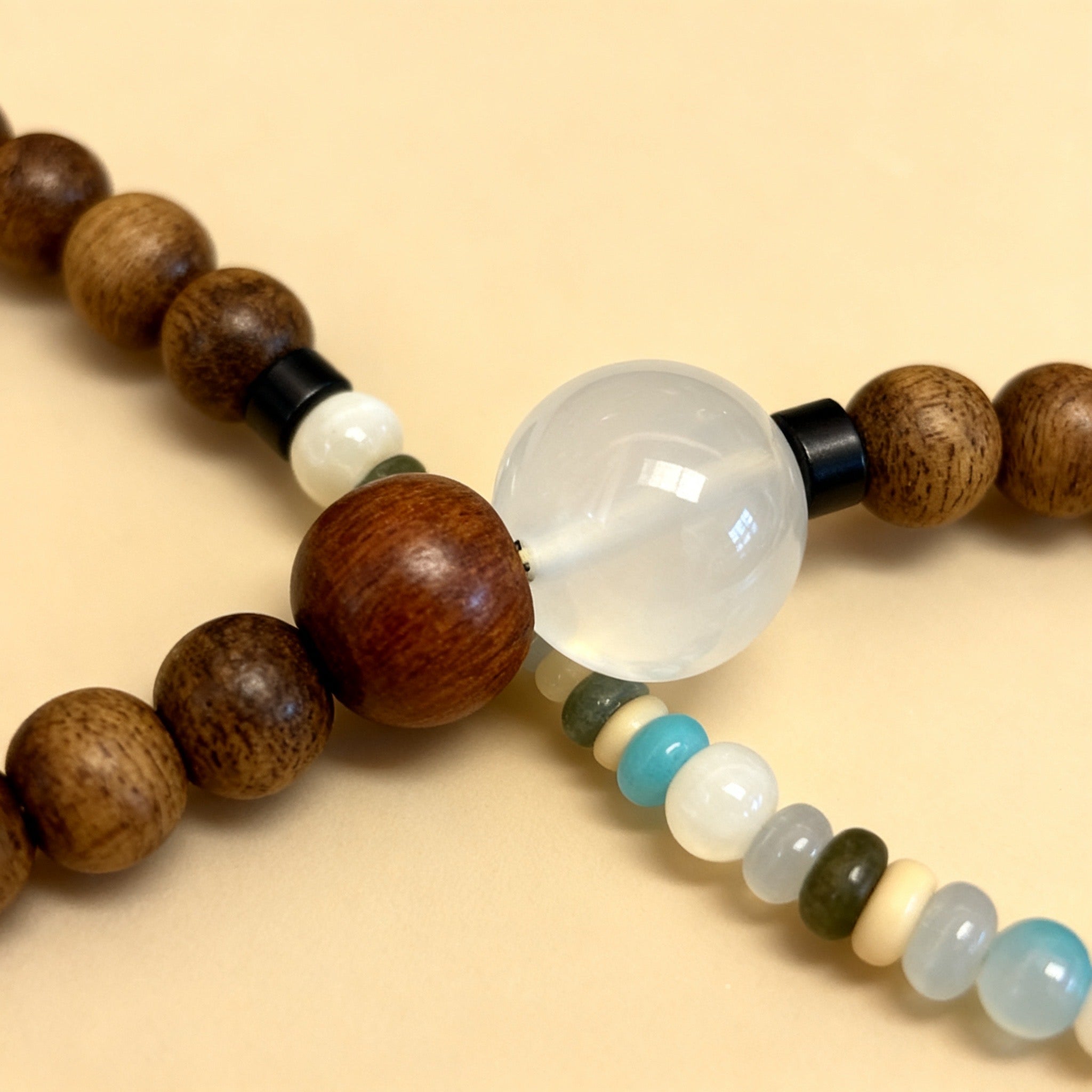 A harmony of Agarwood and natural gemstones